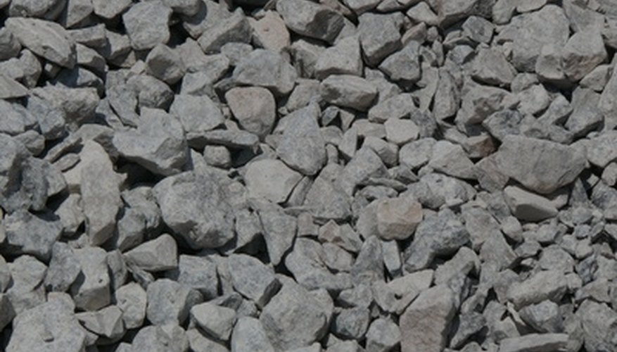 A standard asphalt driveway requires 8 to 12 inches of crushed gravel for the sub-layer. A standard asphalt driveway requires 8 to 12 inches of crushed gravel for the sub-layer.