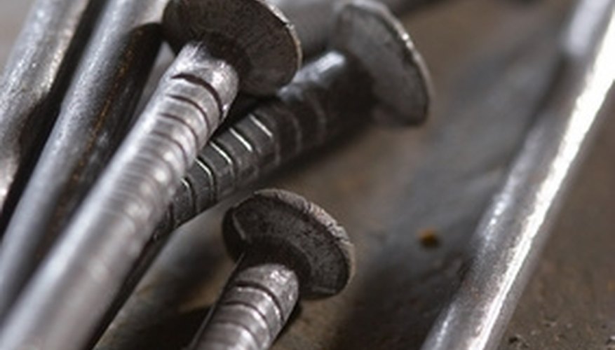 Two 16d nails and a 3/16-inch hole make an inexpensive fastener. Two 16d nails and a 3/16-inch hole make an inexpensive fastener.