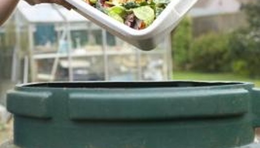 Once you set up your composting bin, adding kitchen scraps becomes an easy routine. Once you set up your composting bin, adding kitchen scraps becomes an easy routine.