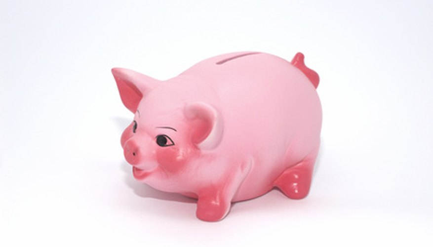 Some antique piggy banks had to be smashed to be opened. Some antique piggy banks had to be smashed to be opened.