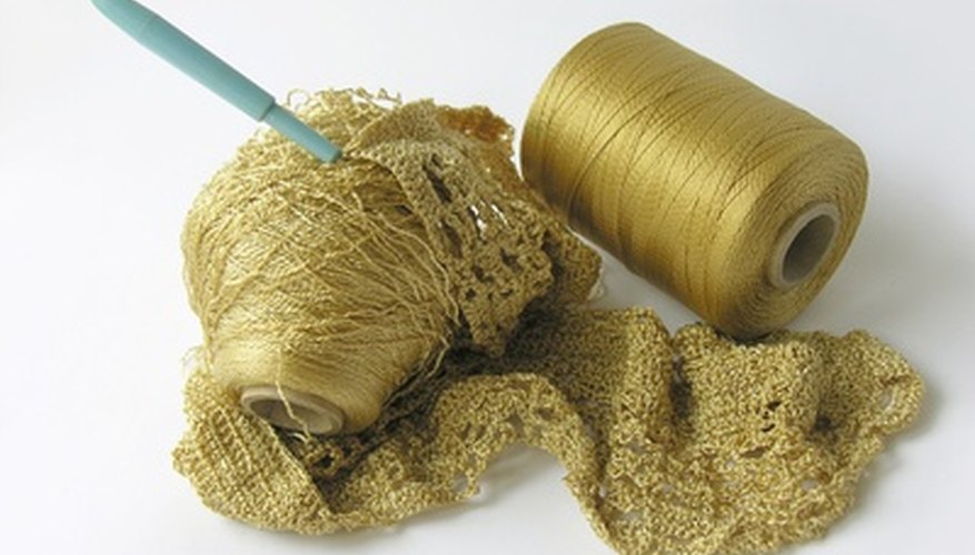 Metallic yarn creates a shimmery scarf for dressy occasions. Metallic yarn creates a shimmery scarf for dressy occasions.