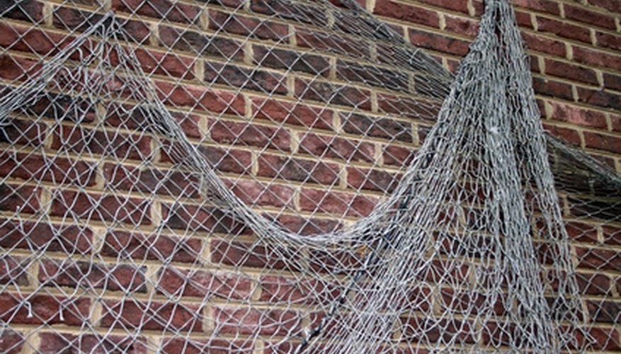 Use heavy-duty netting to make a cricket practice net. Use heavy-duty netting to make a cricket practice net.