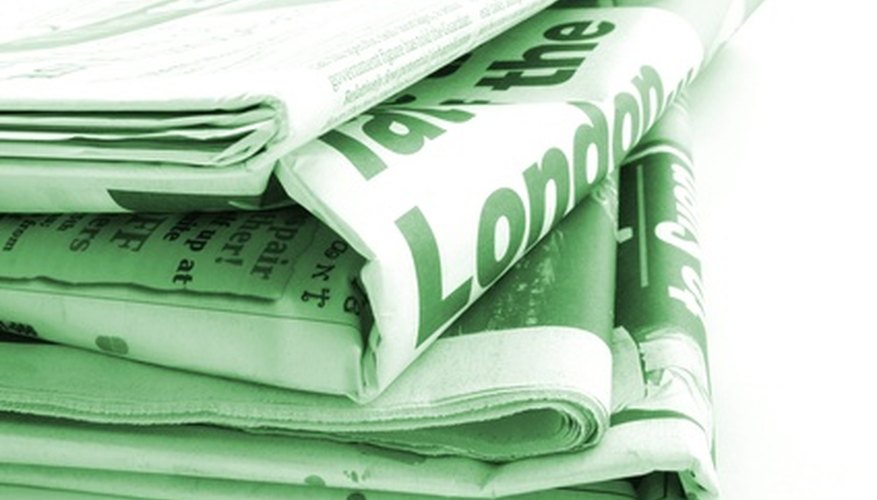 Cut newspapers into thin slivers. Cut newspapers into thin slivers.