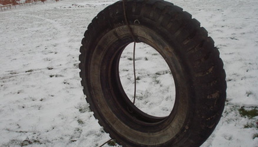 No matter the year, a tire swing represents fun. No matter the year, a tire swing represents fun.