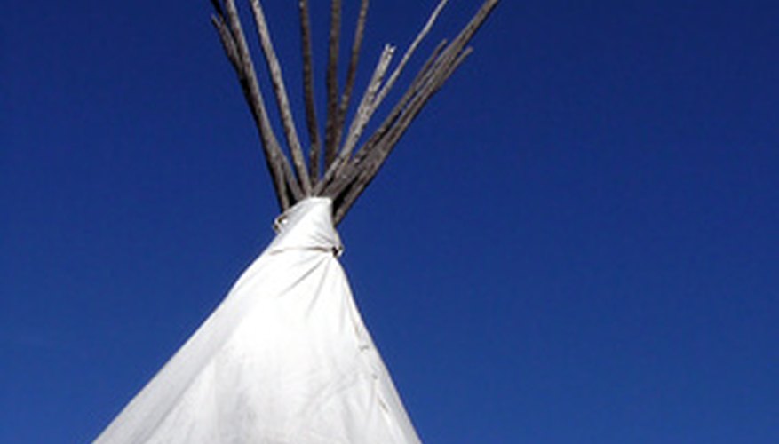 Making a teepee out of construction paper is a simple task. Making a teepee out of construction paper is a simple task.