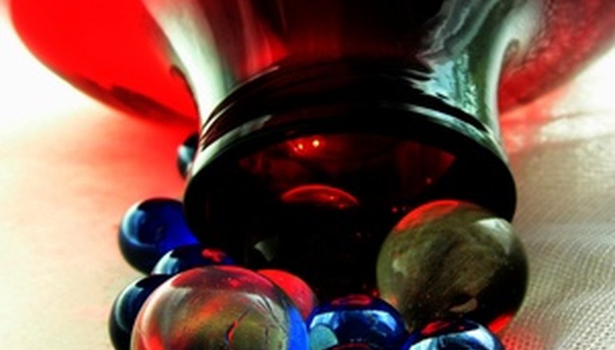 Marbles can be melted and fused to glazed ceramics. Marbles can be melted and fused to glazed ceramics.