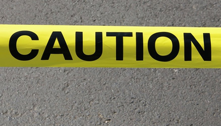 Paint caution tape with your own message. Paint caution tape with your own message.