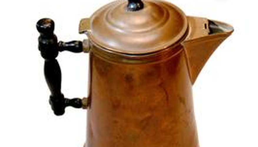 A patina can give an aluminum pitcher a copper color. A patina can give an aluminum pitcher a copper color.