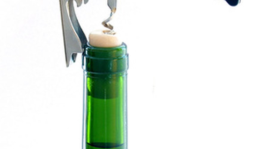 After you pop the cork on your wine, you can seal it with a stopper. After you pop the cork on your wine, you can seal it with a stopper.