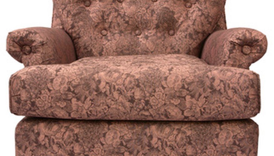 Cover a swivel rocking chair to give it a new look. Cover a swivel rocking chair to give it a new look.