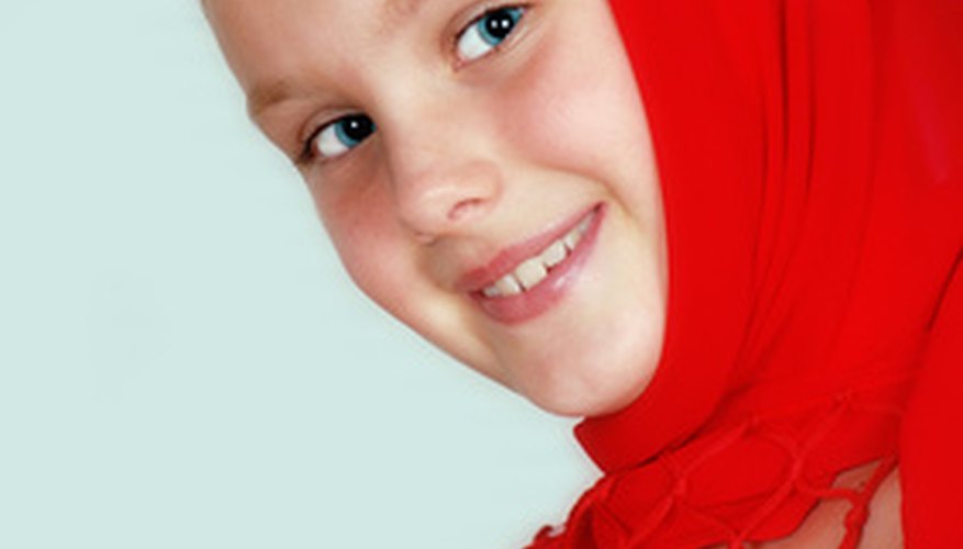 A snood, also called a hooded scarf, can be worn as a hat and scarf combo or as a scarf. A snood, also called a hooded scarf, can be worn as a hat and scarf combo or as a scarf.