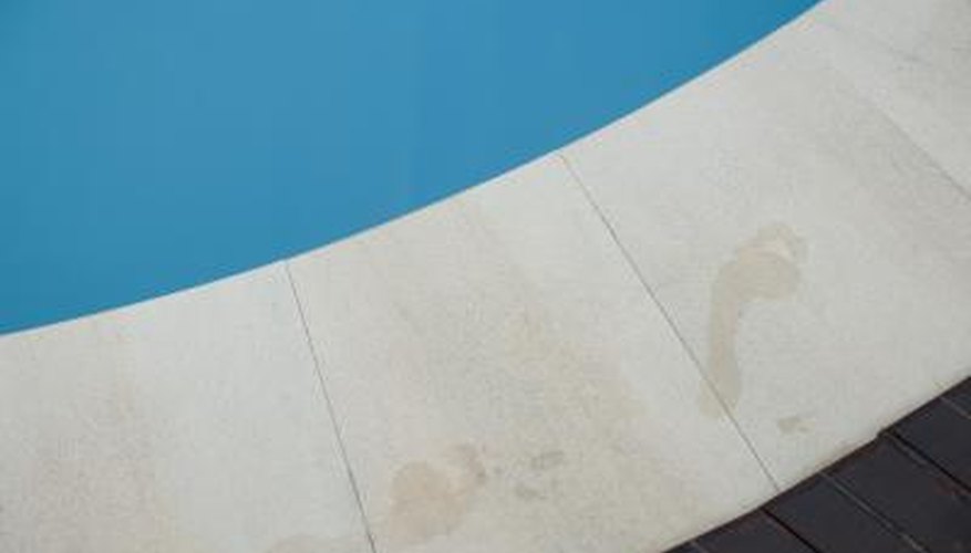 Sandstone pool edging juxtaposed against a brick pool deck. Sandstone pool edging juxtaposed against a brick pool deck.