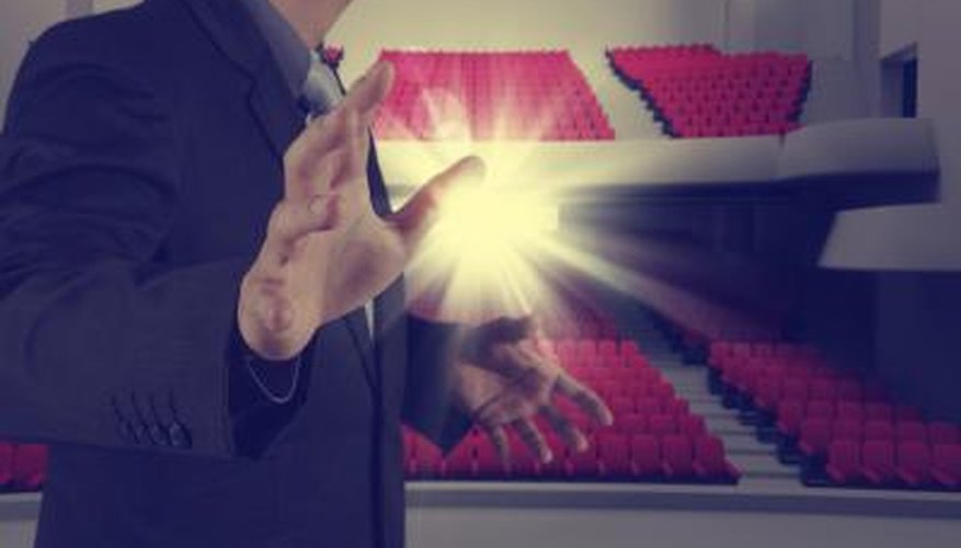 Performer on stage, seats in the background. Performer on stage, seats in the background.