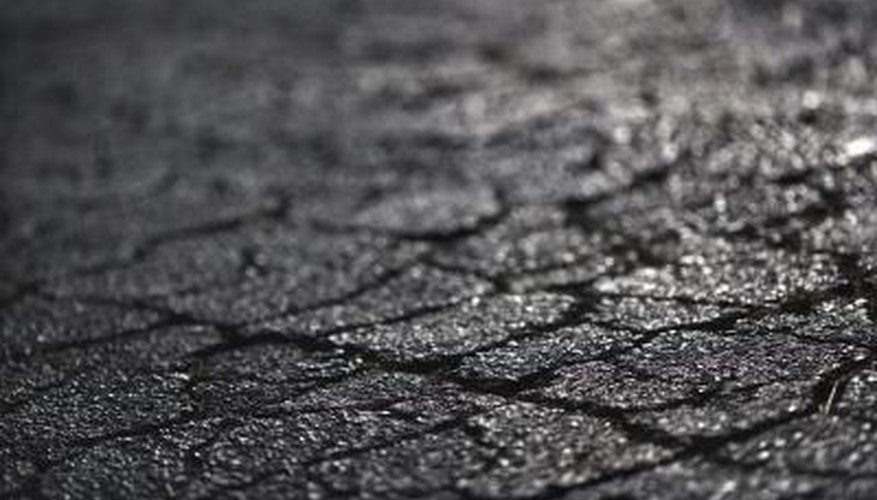 Close-up of cracked pavement Close-up of cracked pavement