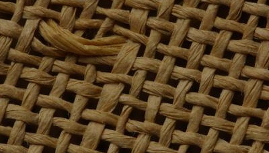 WInter damage on holly can be prevented with a burlap wind screen. WInter damage on holly can be prevented with a burlap wind screen.
