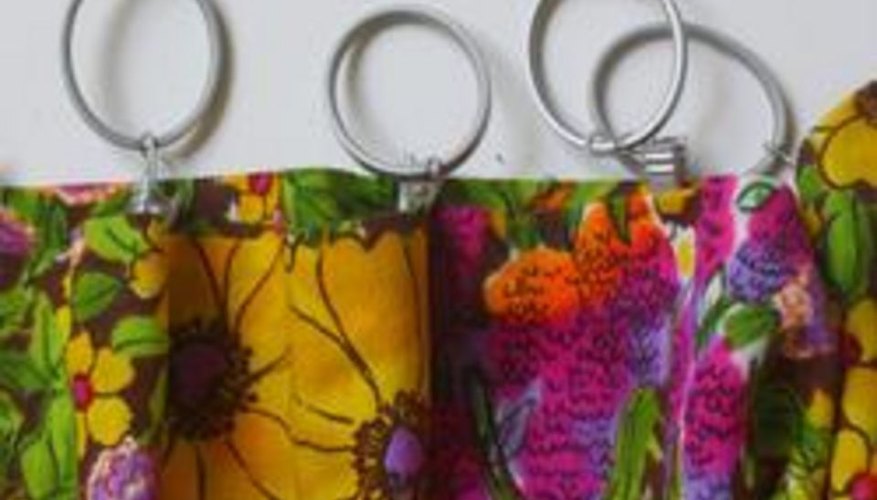 Adding the curtain clips. Adding the curtain clips.