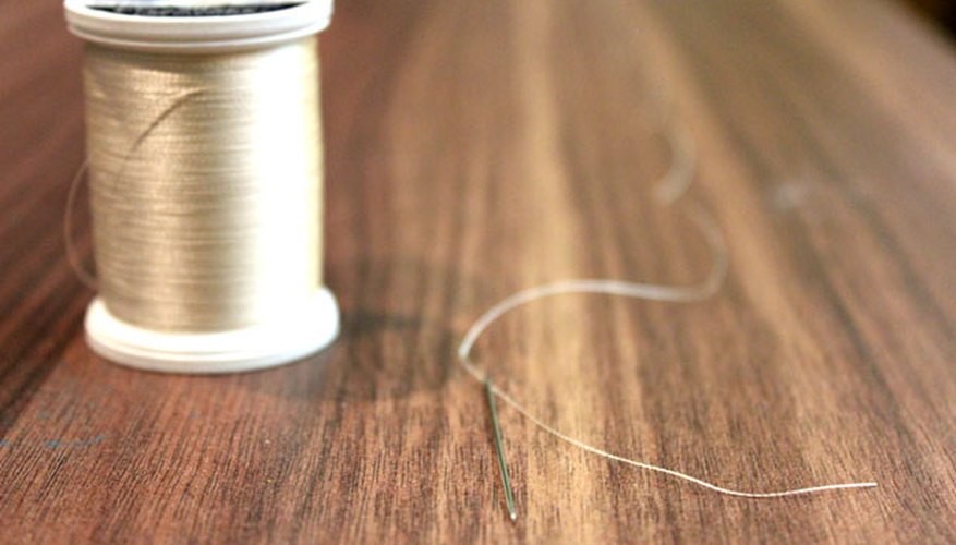 Cut thread to desired length Cut thread to desired length