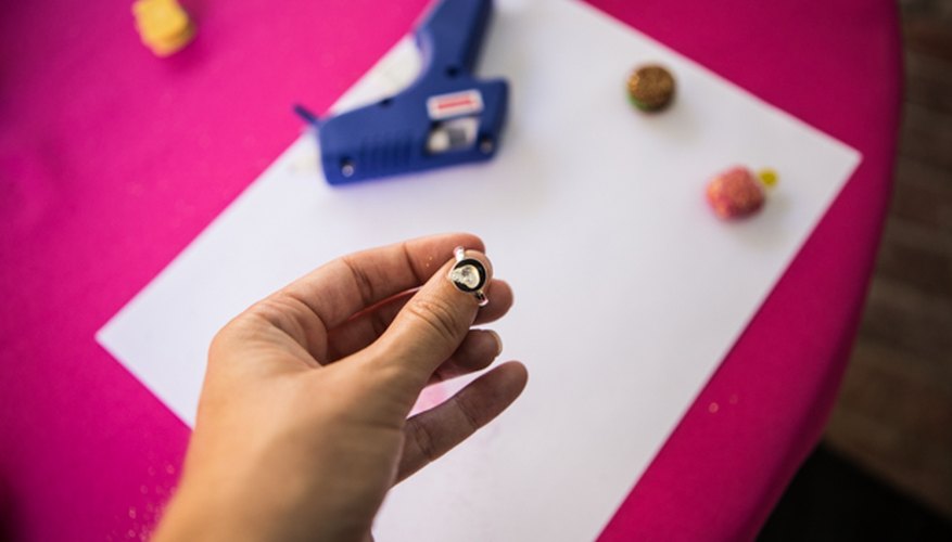 Photo Credit: Susie Delaney Glue the trinket to the ring base.