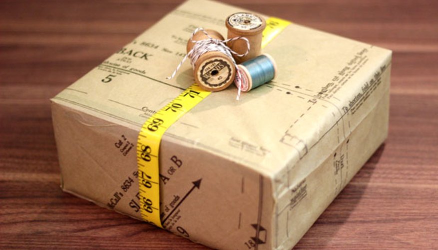 Photo Credit: Jonathan Fong Decorate the box with measuring tape and spools