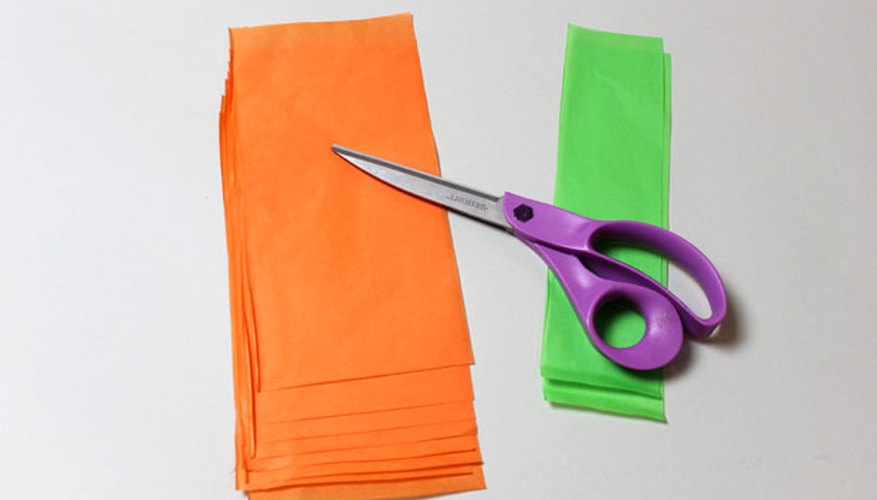 Photo Credit: Jonathan Fong Cut the tissue paper in two sizes