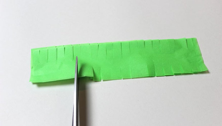 Photo Credit: Jonathan Fong Cut slits along the edges of the narrow strips