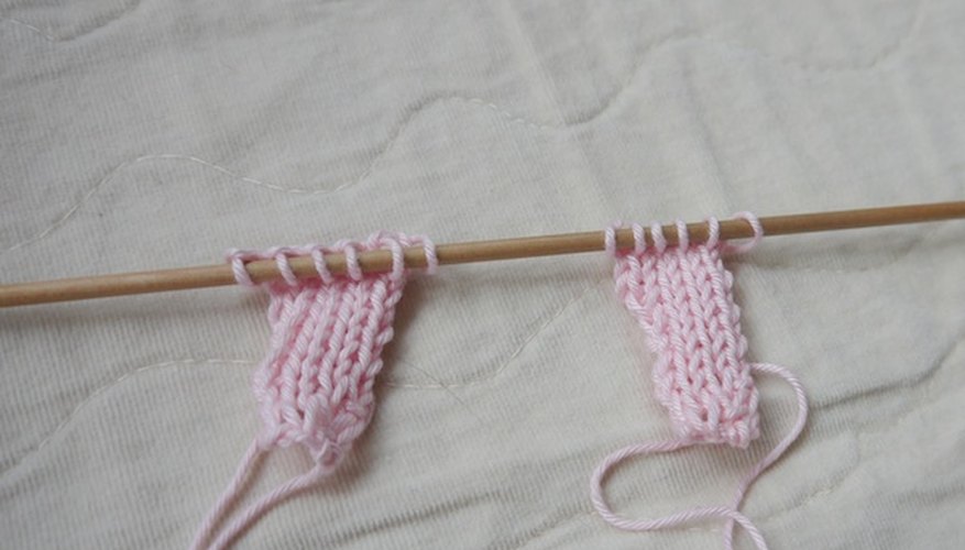 Leave the first petal resting on the needle while you knit the next. Leave the first petal resting on the needle while you knit the next.
