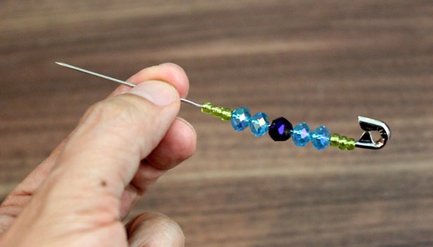 String the beads with the safety pin wire String the beads with the safety pin wire