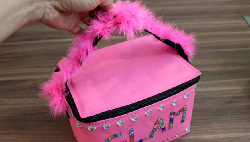 Tie a feather boa to the handle Tie a feather boa to the handle