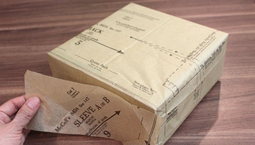 Photo Credit: Jonathan Fong Wrap the box with the sewing pattern