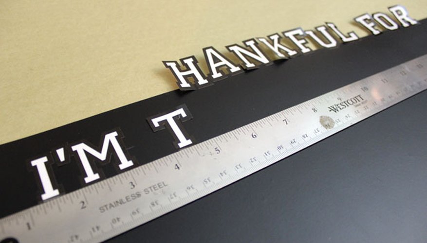 Apply adhesive letters Apply adhesive letters