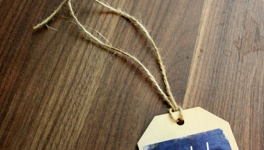 Tie a string around the hole Tie a string around the hole
