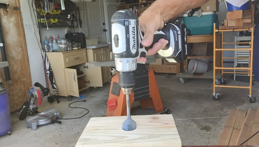 Drill a hole 2 1/2 inches deep. Drill a hole 2 1/2 inches deep.