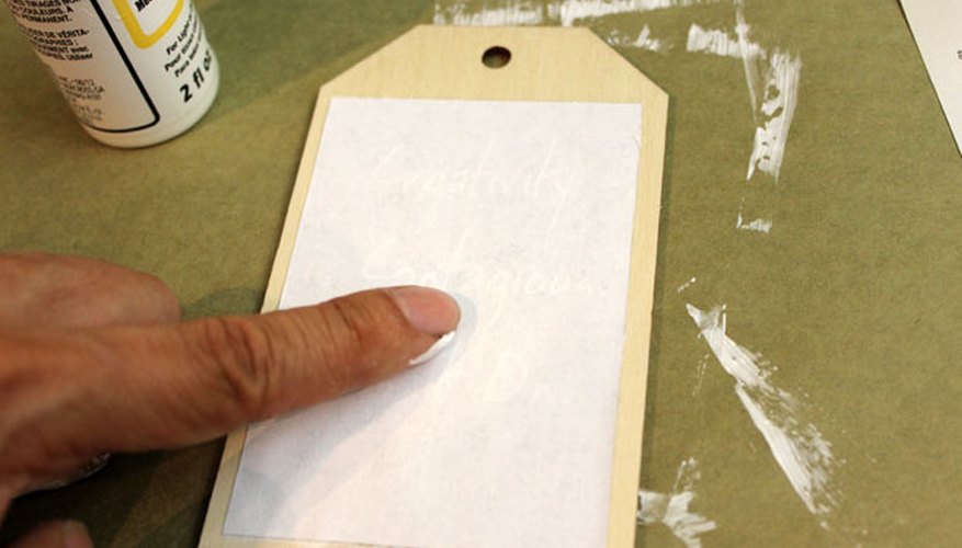 Place the paper image side down on the wood Place the paper image side down on the wood