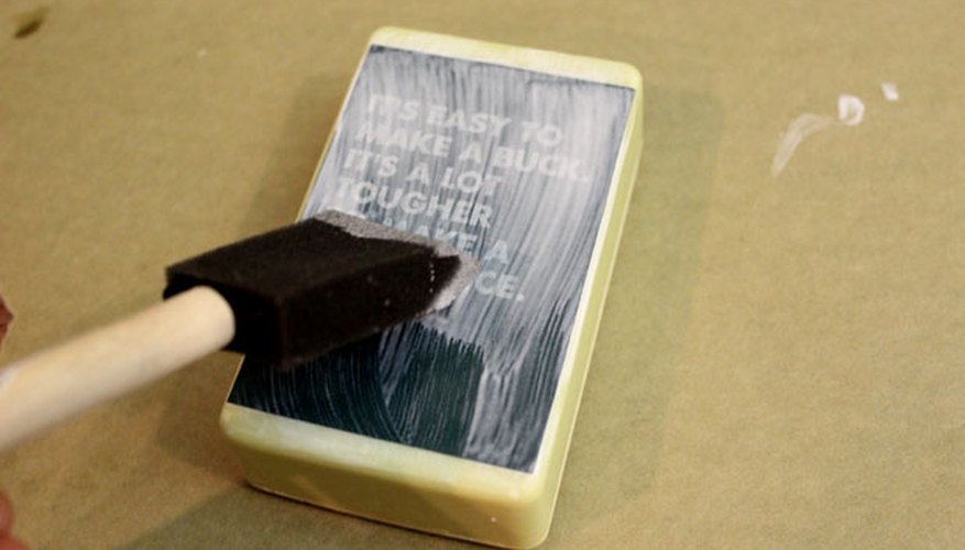 Photo Credit: Jonathan Fong Apply decoupage glue on top of the image