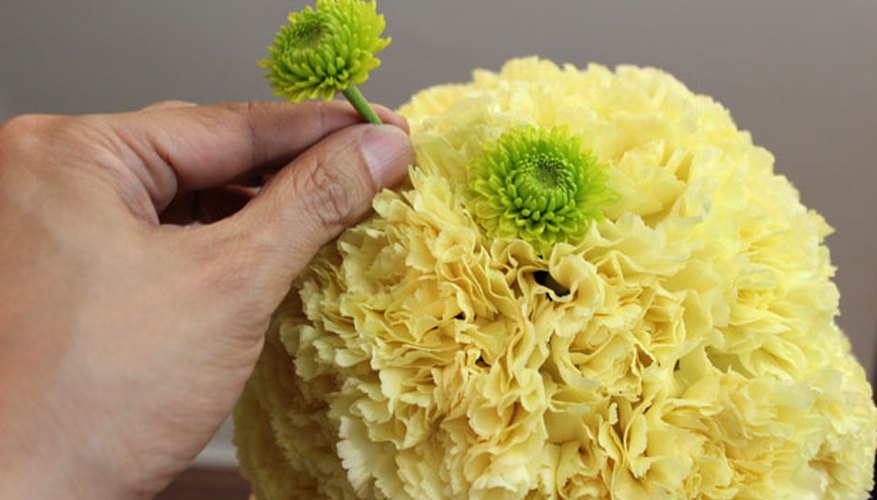 Make polka dots with pom poms Make polka dots with pom poms