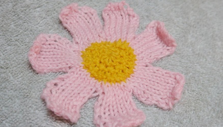 Stretch the petals so they lay flat. Stretch the petals so they lay flat.