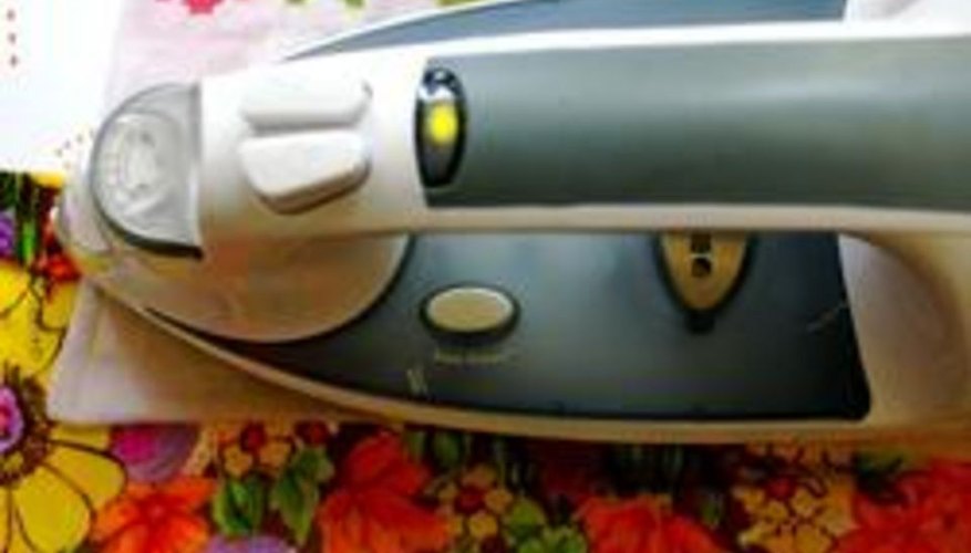 Ironing with a damp cloth. Ironing with a damp cloth.
