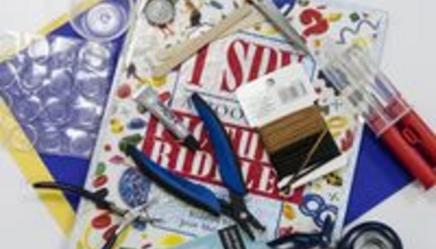 Supplies for bottle cap necklaces. Supplies for bottle cap necklaces.