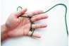 Wrap yarn around the fingers.