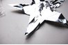 Cut three snips into the points of the foil star.