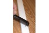 Nail held in place with a pocket comb.