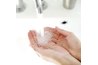 Wash the affected area with a grease-cutting dish liquid immediately.