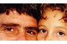Father showing signs of drooping around the eyes, and daughter with youthful eyes