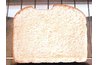 Untoasted bread contains unreacted carbohydrates and proteins.
