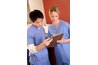 Nurse providing instruction to a unit coordinator, courtesy of google.com.