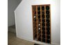 An enclosed under-stairs rack