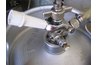 White handle is up, in disengaged position.