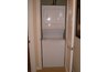 A small washer and dryer are not appropriate for a down comforter.