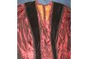 This Victorian dress is made of silk taffeta, cotton velveteen and lace, and polished cotton lining.