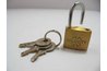 A keyed padlock uses a key to line up the disks or tumblers, releasing the shackle.